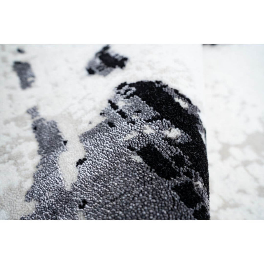 A L V A R luxury handmade rug by Cherom in gray and black New Zealand wool.
