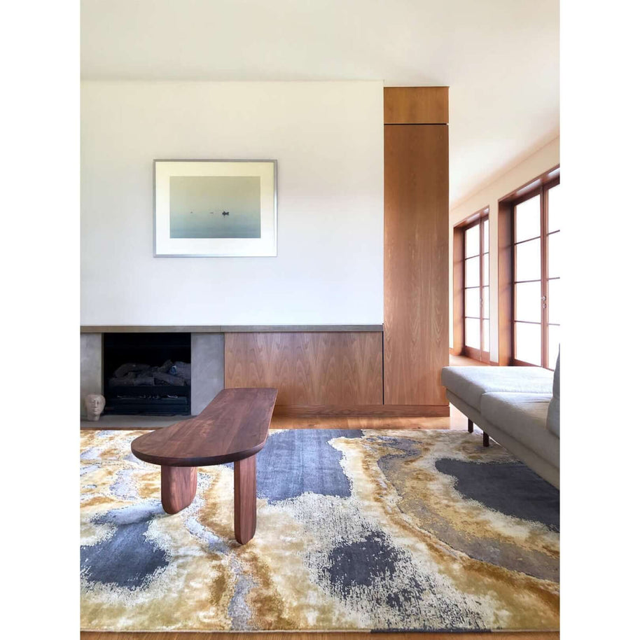 M O N T S E R R A T luxury handmade rug by Cherom in grey, gold, and mustard wool.