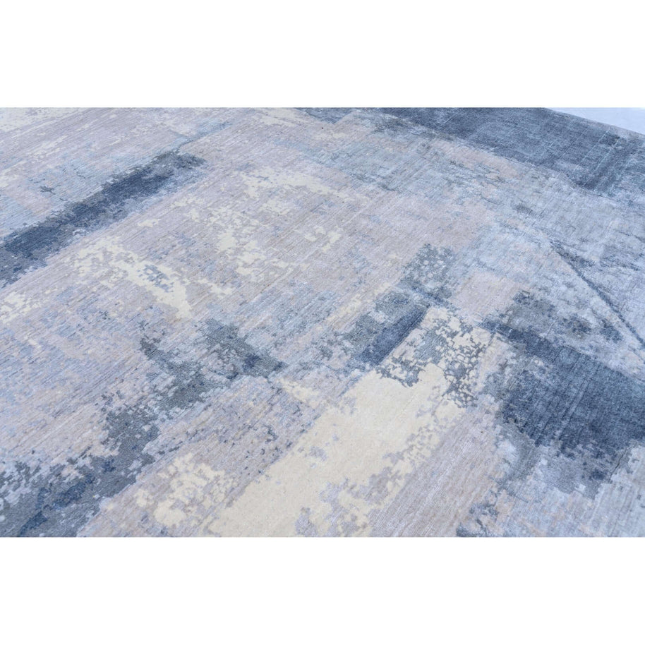 C A M U luxury handmade rug by Cherom in shades of blue, bamboo silk and New Zealand wool.