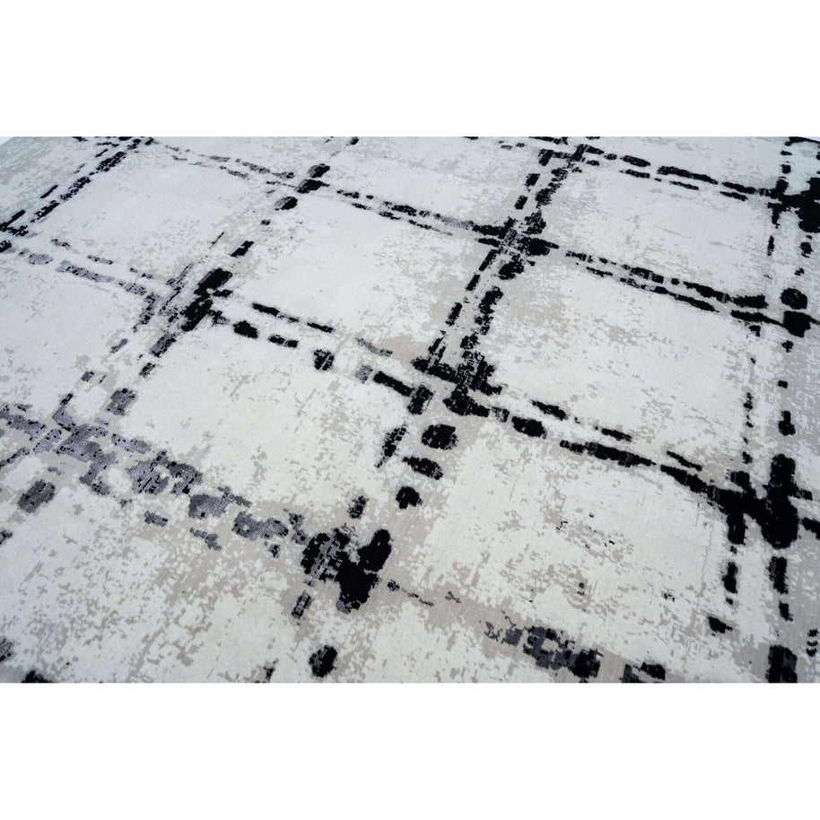 A L V A R luxury handmade rug by Cherom, black and white New Zealand wool modern contemporary design.