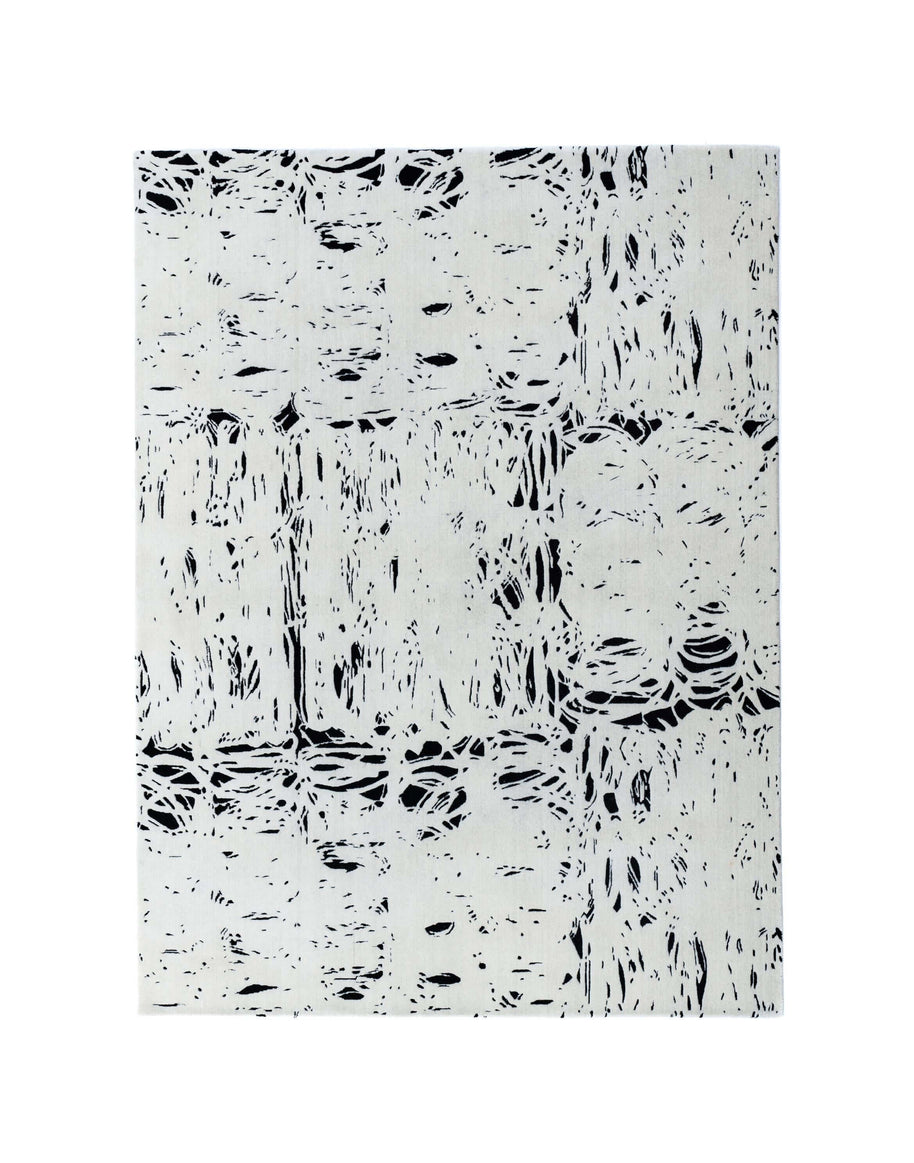 L E N O luxury handmade rug by Cherom in black and white, from New Zealand wool, modern contemporary design.