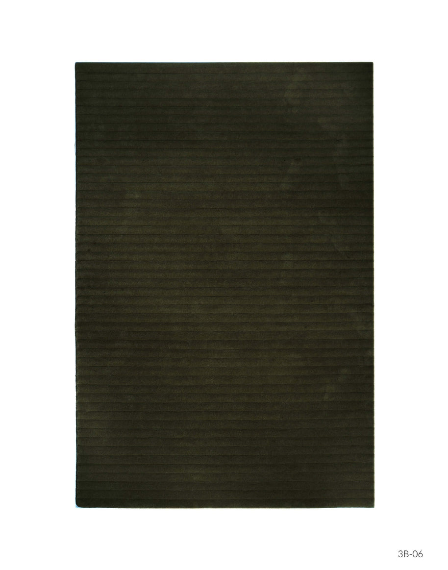 S C U L P T E D - C O R D U R O Y luxury handmade rug by Cherom, dark green New Zealand wool, contemporary design.