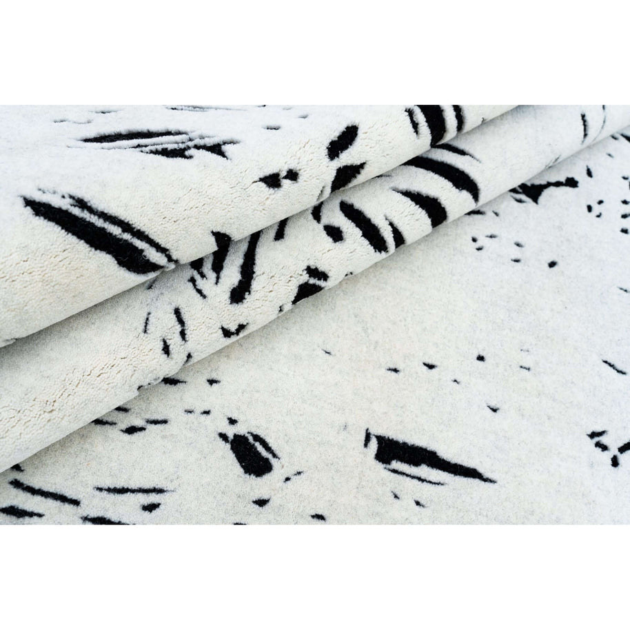 L E N O luxury handmade rug by Cherom in white and black New Zealand wool, modern contemporary design.