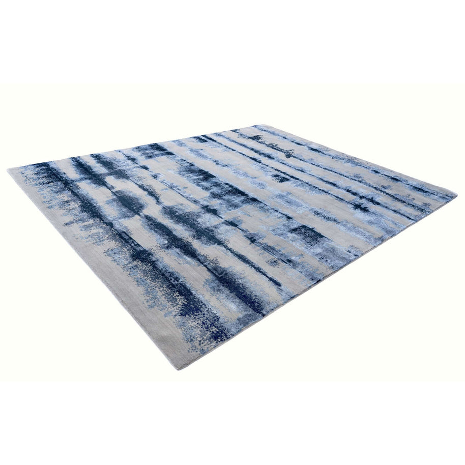 A M B R E T T E luxury handmade rug by Cherom in blue and white New Zealand wool.