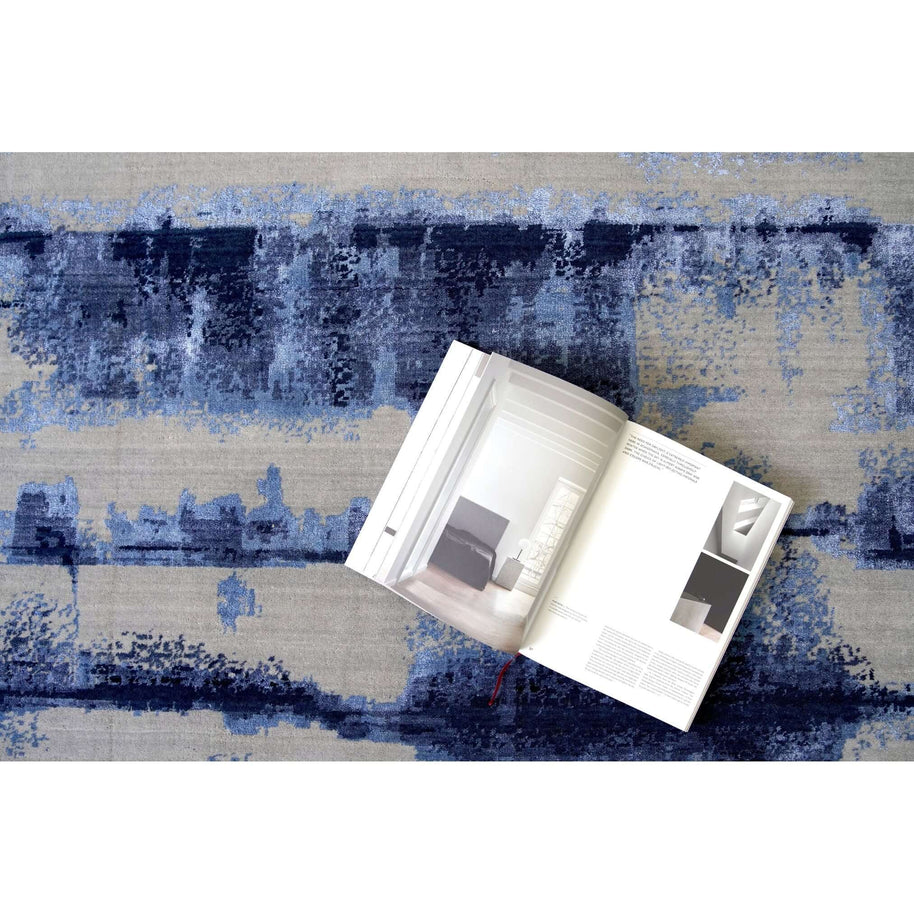 A M B R E T T E luxury handmade rug by Cherom in blue New Zealand wool.