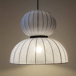 White fabric lampshade crafted from premium cotton linen, enhancing interior aesthetics.
