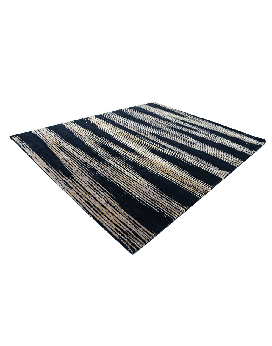 C A R L Y L E luxury handmade rug by Cherom in black and gold New Zealand wool, modern abstract design.