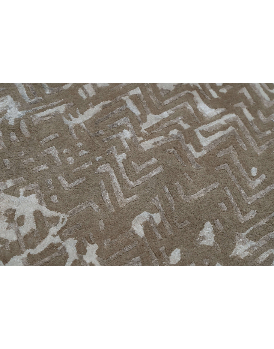 N E I M A N luxury handmade rug by Cherom in rich brown and cream, made of New Zealand wool.