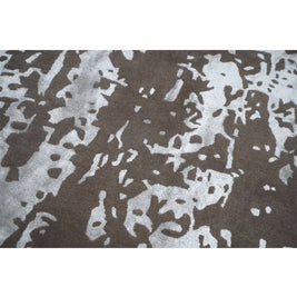 I R V I N G luxury handmade rug by Cherom in brown and silver New Zealand wool with modern abstract design.