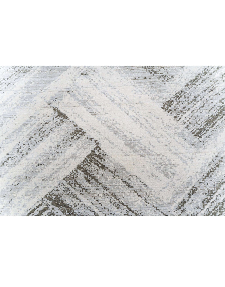 L A N V I N luxury handmade rug by Cherom in soft gray New Zealand wool, modern contemporary design.