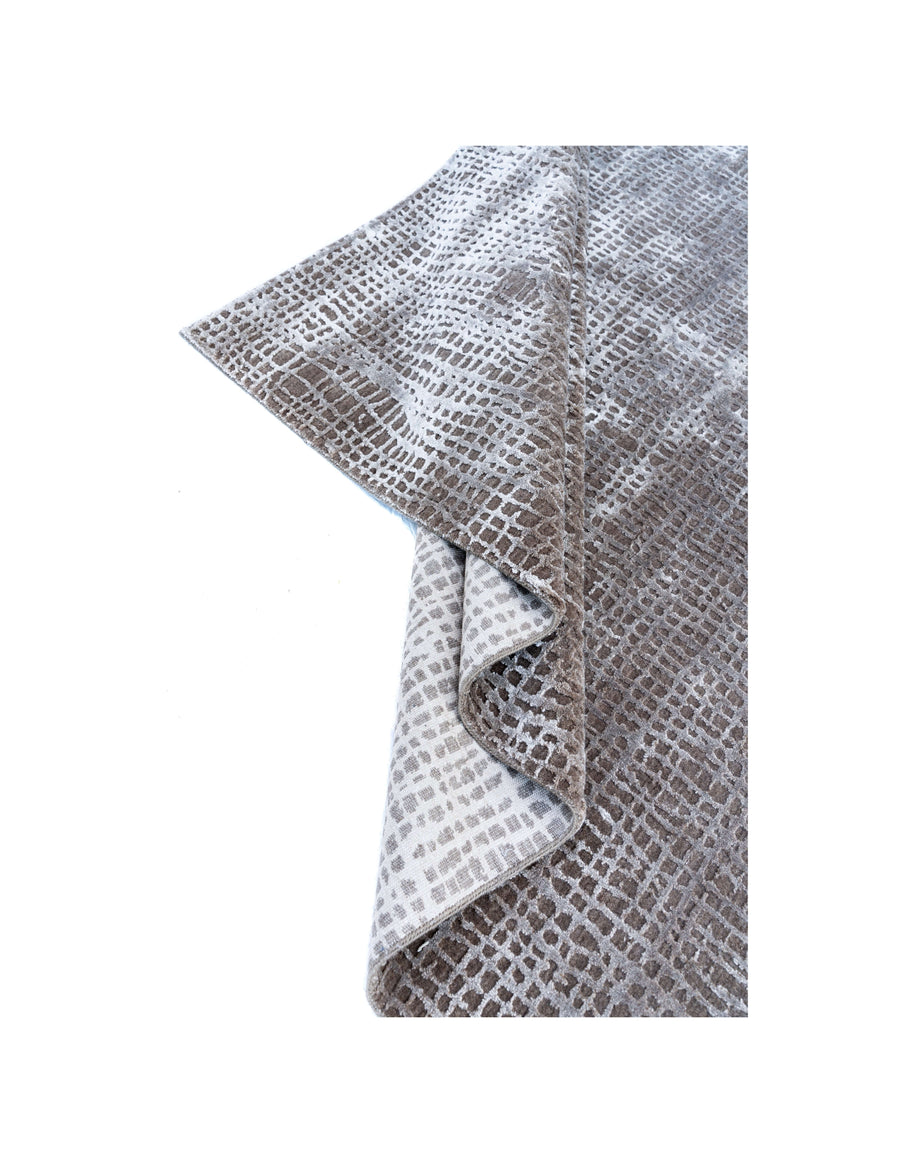 M A R C O luxury handmade rug by Cherom in natural tones, crafted from New Zealand wool and bamboo silk.