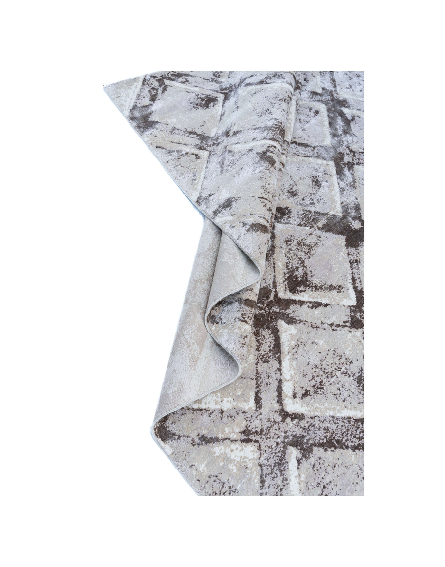 C A Z A D O R luxury handmade rug by Cherom in beige New Zealand wool, modern geometric design.