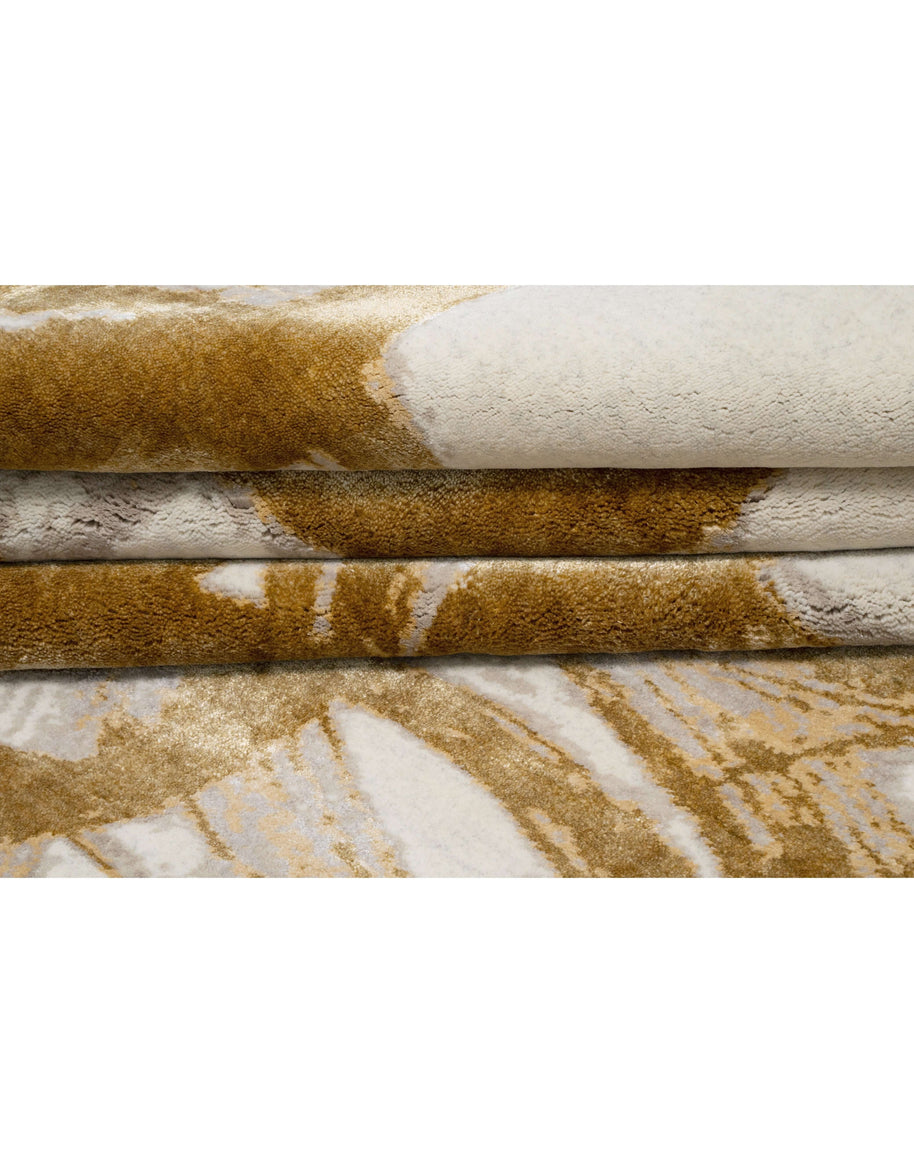 C O R E M luxury handmade rug by Cherom in ivory and gold, crafted from New Zealand wool.