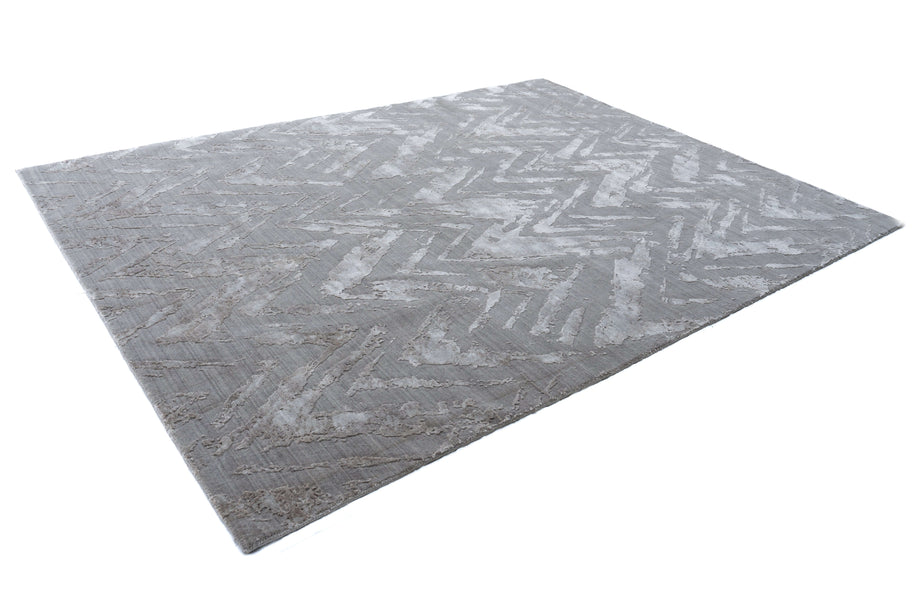 C E L I N E luxury handmade rug by Cherom in grey, crafted from bamboo silk and New Zealand wool.