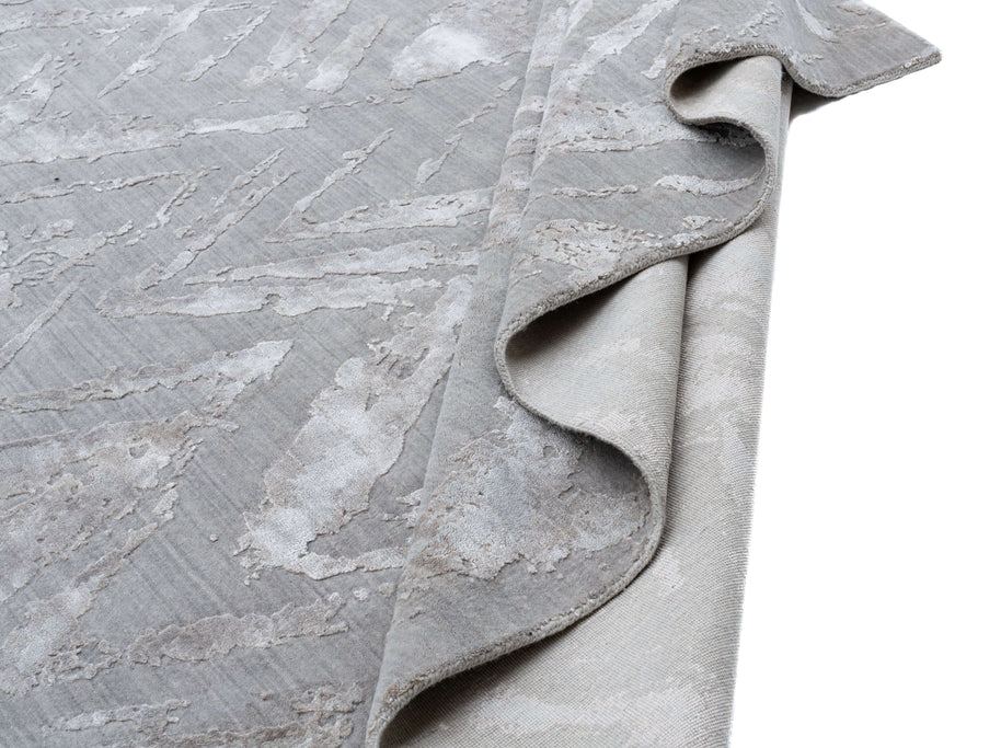 C E L I N E luxury handmade rug by Cherom in grey, bamboo silk and New Zealand wool.