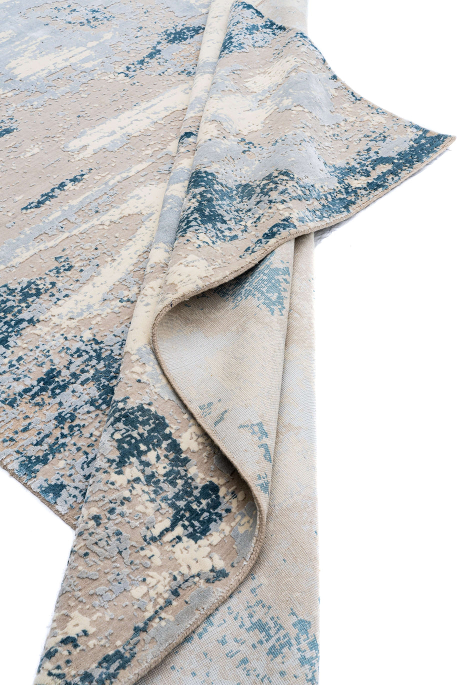 B E R E T T A luxury handmade rug by Cherom in blue and beige New Zealand wool, featuring contemporary design.