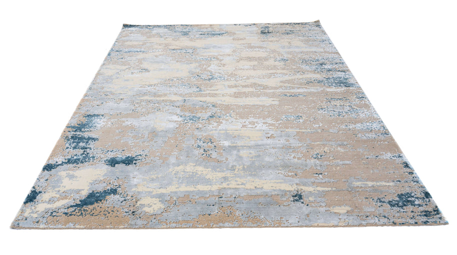 B E R E T T A luxury handmade rug by Cherom, crafted from modern New Zealand wool, infused with blue and beige tones.