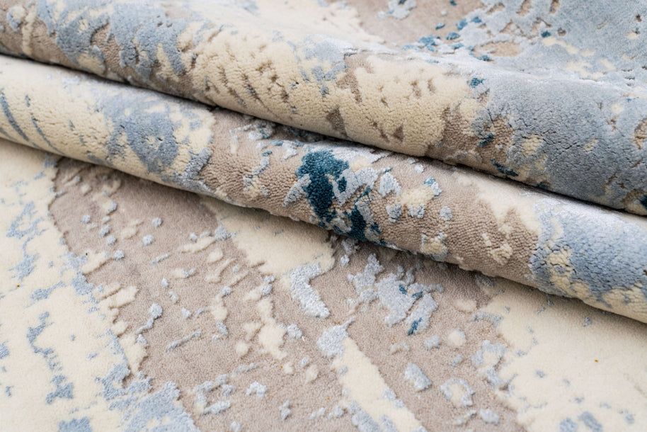 B E R E T T A luxury handmade rug by Cherom, featuring soft colors in New Zealand wool.