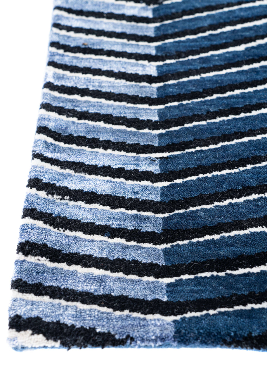 E L L I P S E luxury handmade rug by Cherom in blue New Zealand wool, modern design.