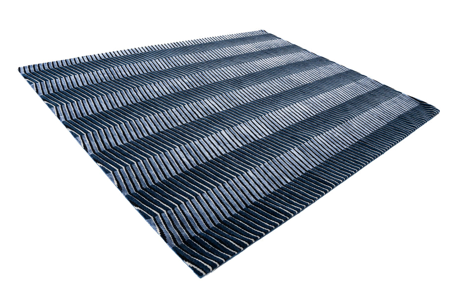 E L L I P S E luxury handmade rug by Cherom in navy New Zealand wool.