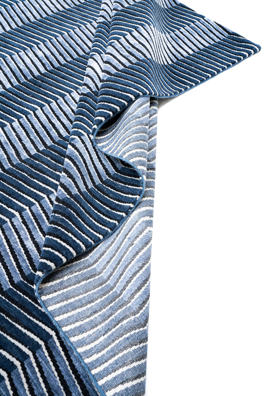 E L L I P S E luxury handmade rug by Cherom in blue New Zealand wool and viscose.