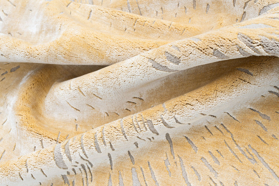 S U N B U R S T luxury handmade rug by Cherom in beige New Zealand wool with contemporary design patterns.