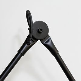 Adjustable wall lamp that pivots and extends, offering flexible lighting for reading or ambient use.