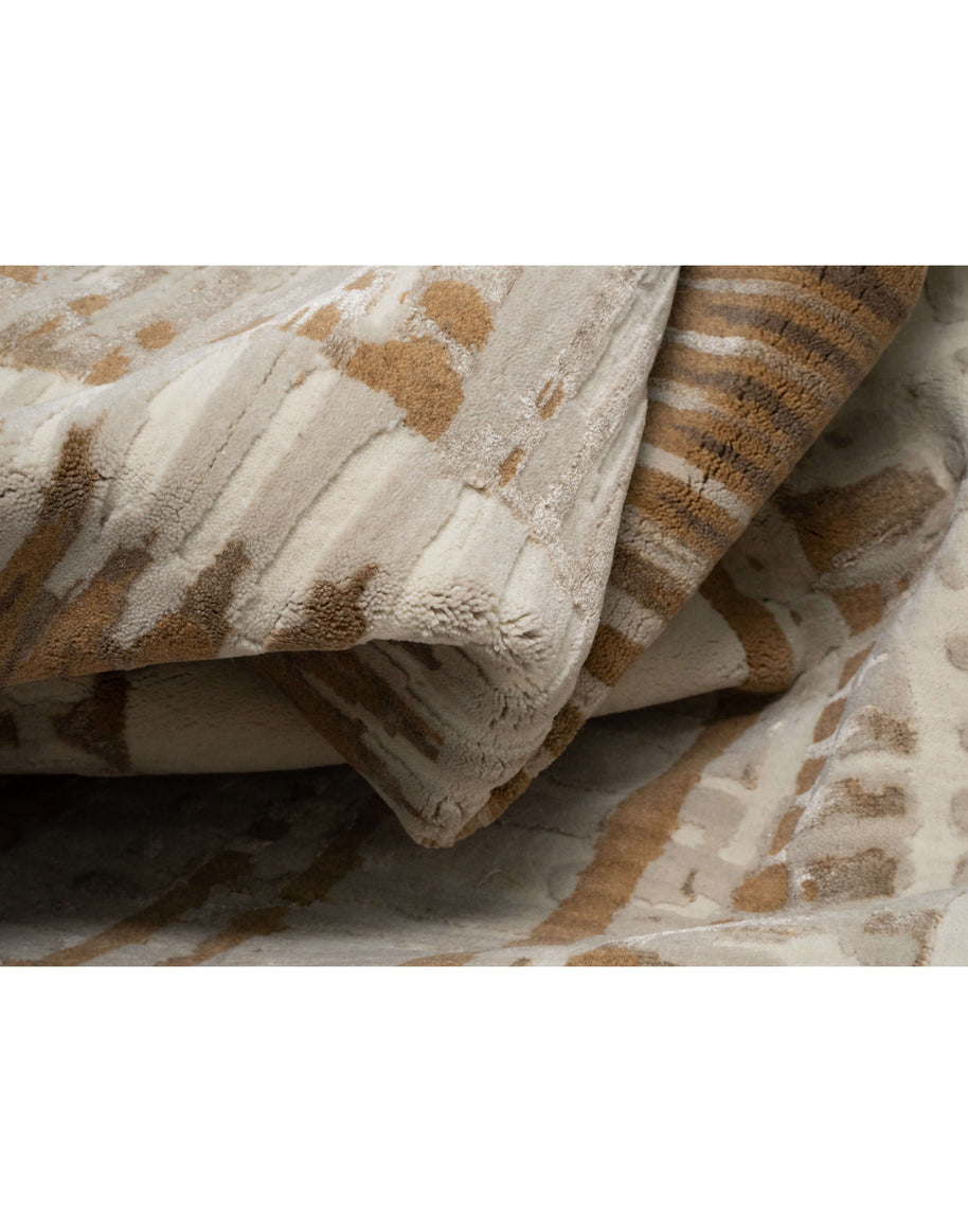 E D A N luxury handmade rug by Cherom in ivory and brown New Zealand wool with contemporary design.