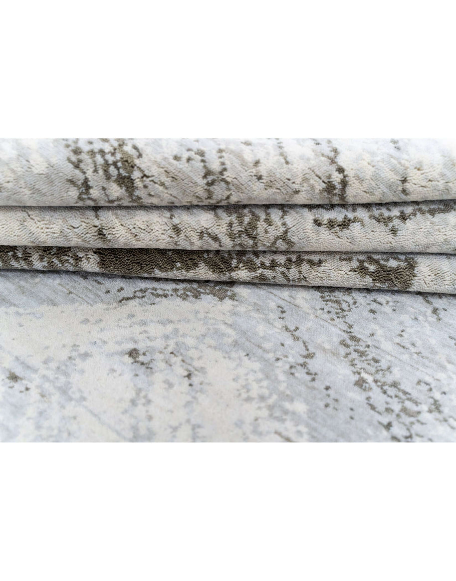 L A N V I N luxury handmade rug by Cherom in New Zealand wool with modern gray tones.