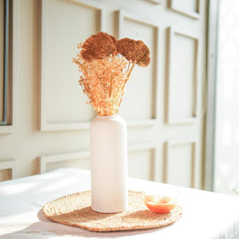 Golden harvest bunch with snow white vase