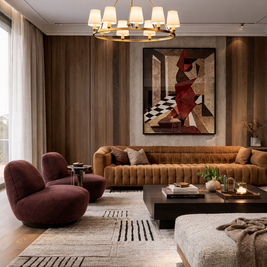Modern living room with brown sofa, purple armchair, and abstract painting on wall.