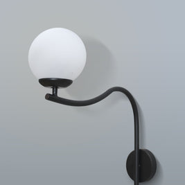 Contemporary arched wall lamp with a sleek black design and a soft-diffused white lampshade, mounted in a living room