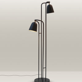Contemporary floor lamp with a minimalist design and dual adjustable heads for versatile lighting.
