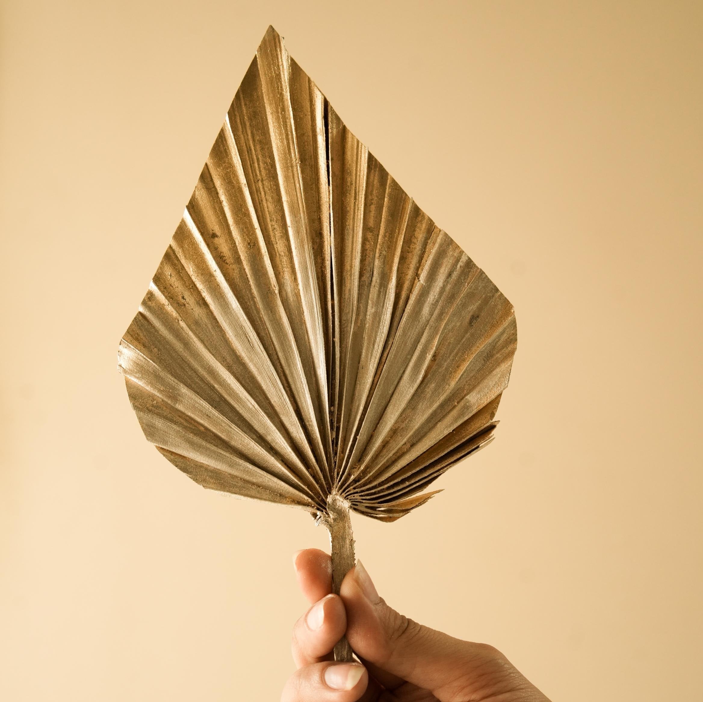 Golden Silver dual tone palm leaves - https://artecasa.in/