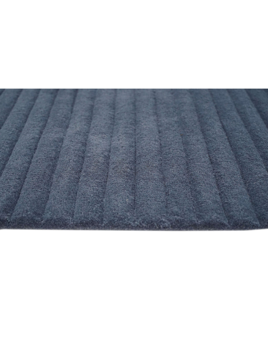 S C U L P T E D - C O R D U O Y luxury handmade rug by Cherom in deep blue New Zealand wool.