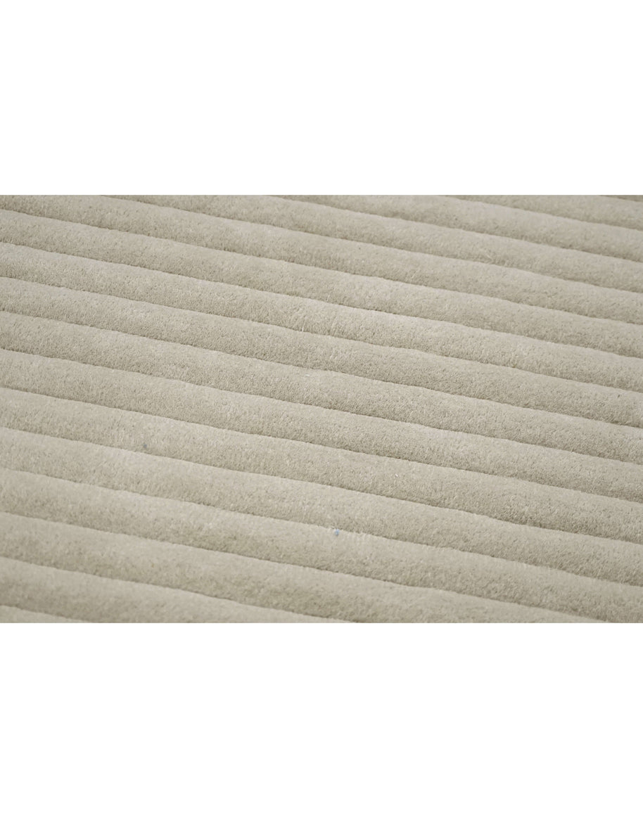 S C U L P T E D - C O R D U O Y luxury handmade rug by Cherom, soft beige New Zealand wool, contemporary design.