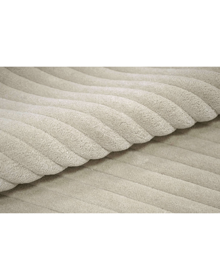 S C U L P T E D - C O R D U R O Y luxury handmade rug by Cherom, soft beige New Zealand wool, contemporary design.