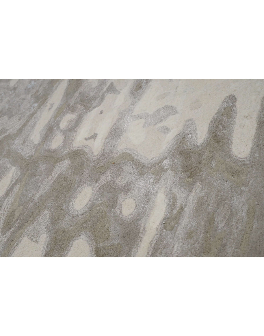 E L S A luxury handmade rug by Cherom, New Zealand wool, beige and grey, modern rug with abstract design.