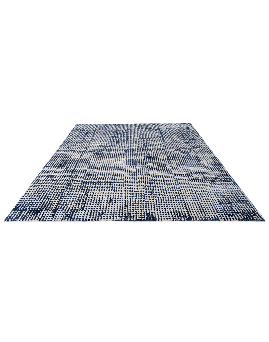 O D M É luxury handmade rug by Cherom, blue color, New Zealand wool, modern contemporary design.
