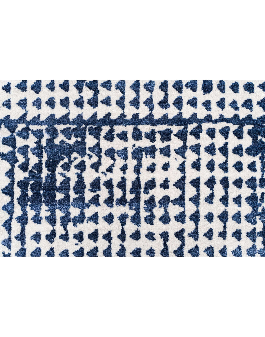 O D M É luxury handmade rug by Cherom, blue New Zealand wool, contemporary design.