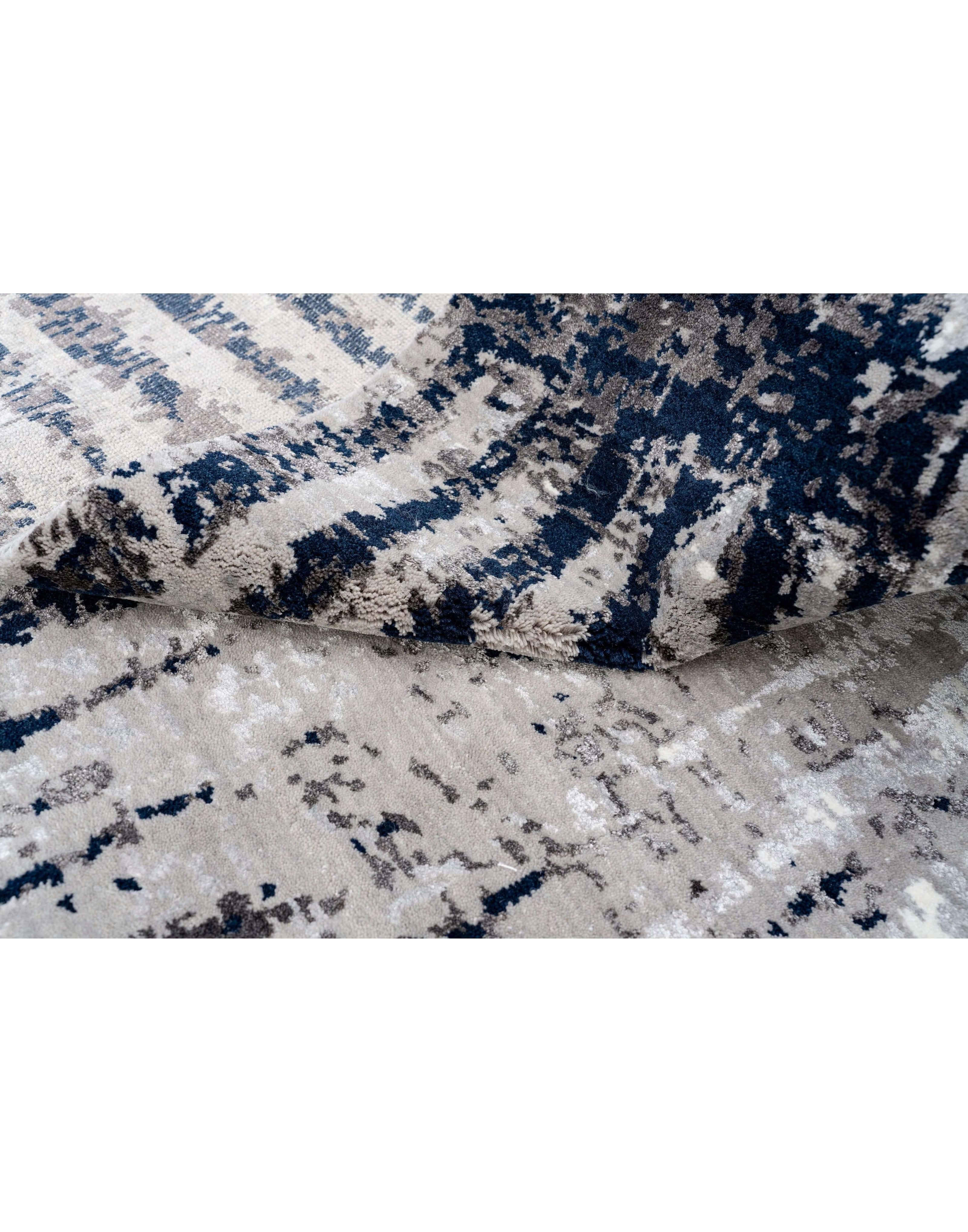 A V E R I L L luxury handmade rug by Cherom, modern design in New Zealand wool, blue and beige tones.