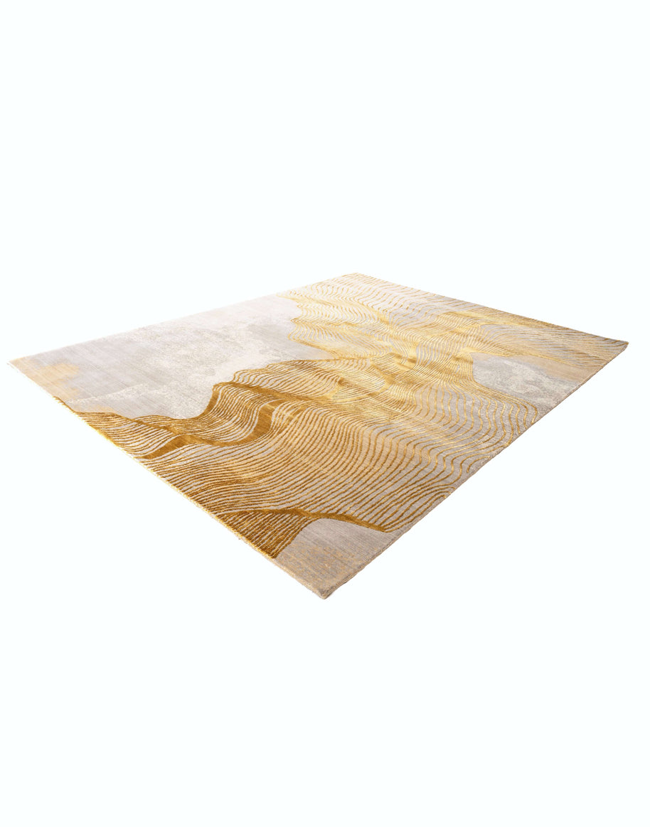 B R I E L L E luxury handmade rug by Cherom in wool and viscose, featuring modern gold design.