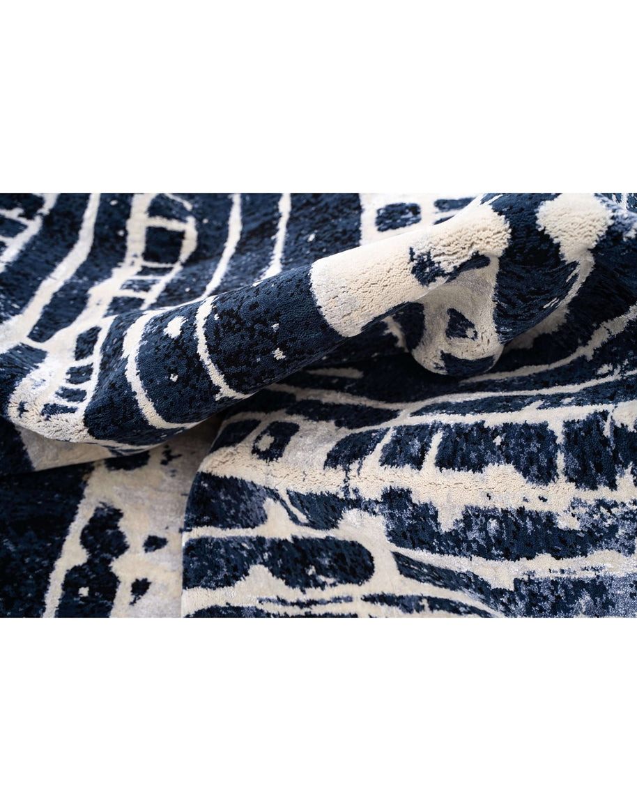 M A R C O N I luxury handmade rug by Cherom in navy New Zealand wool.