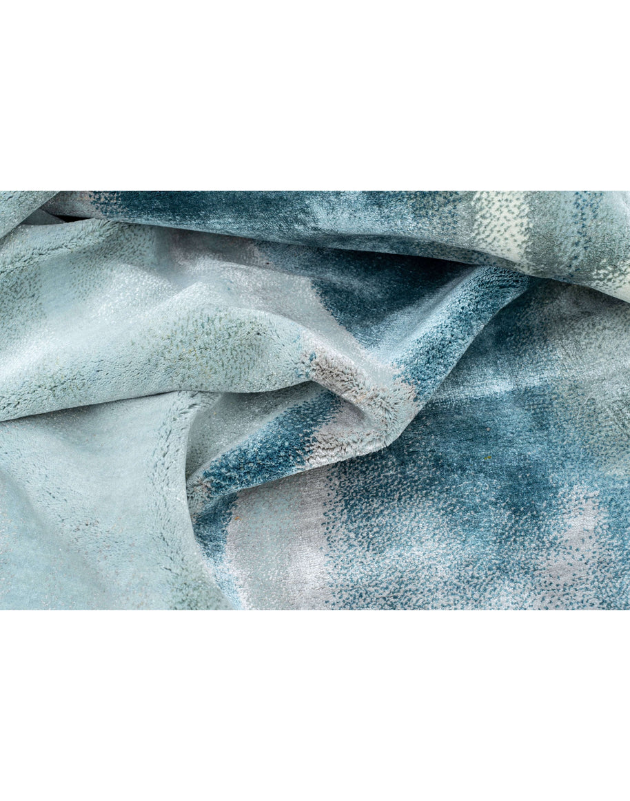 B A X T E R luxury handmade rug by Cherom in blue and grey New Zealand wool.