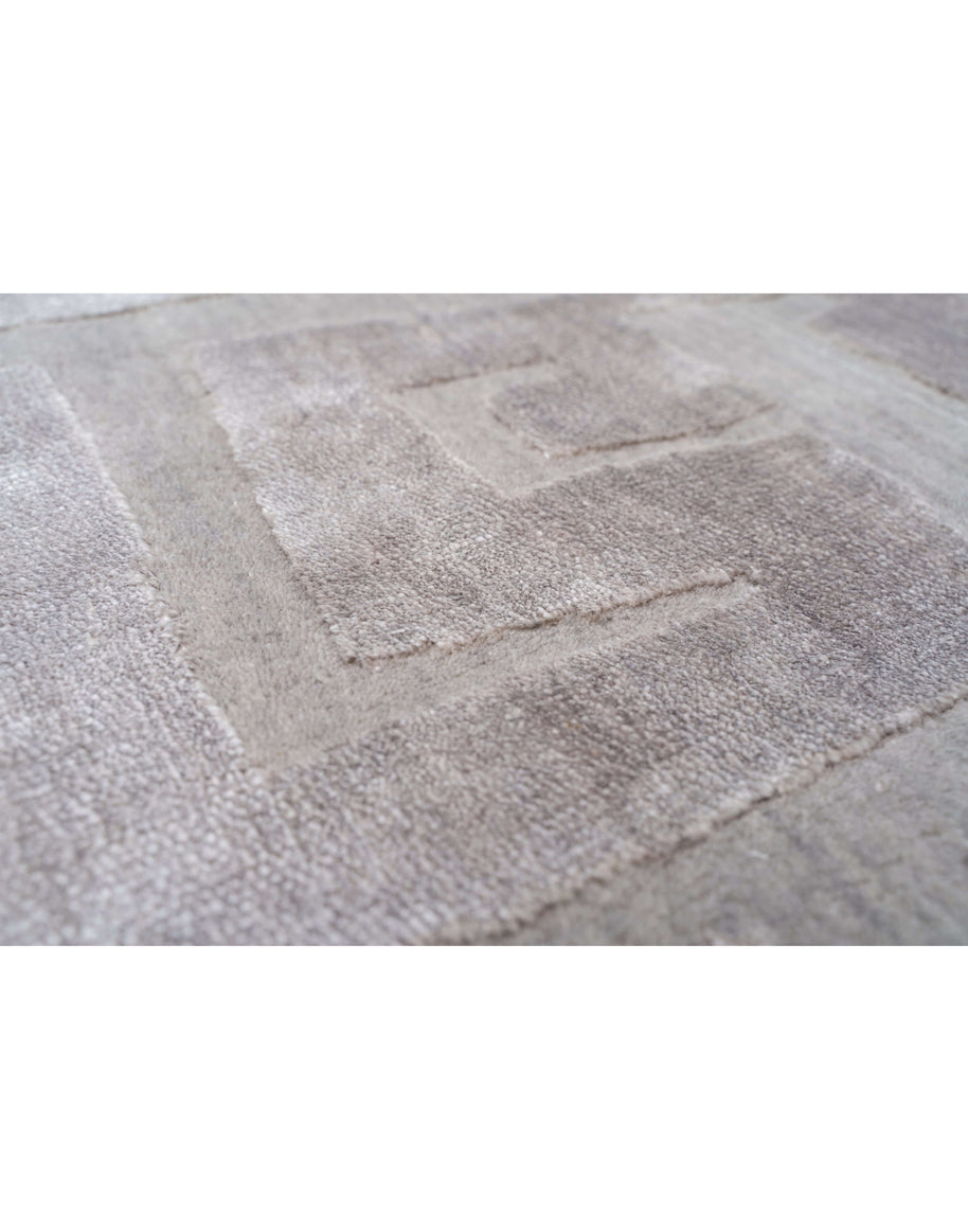 O R S A Y luxury handmade rug by Cherom, wool and viscose, modern geometric design.
