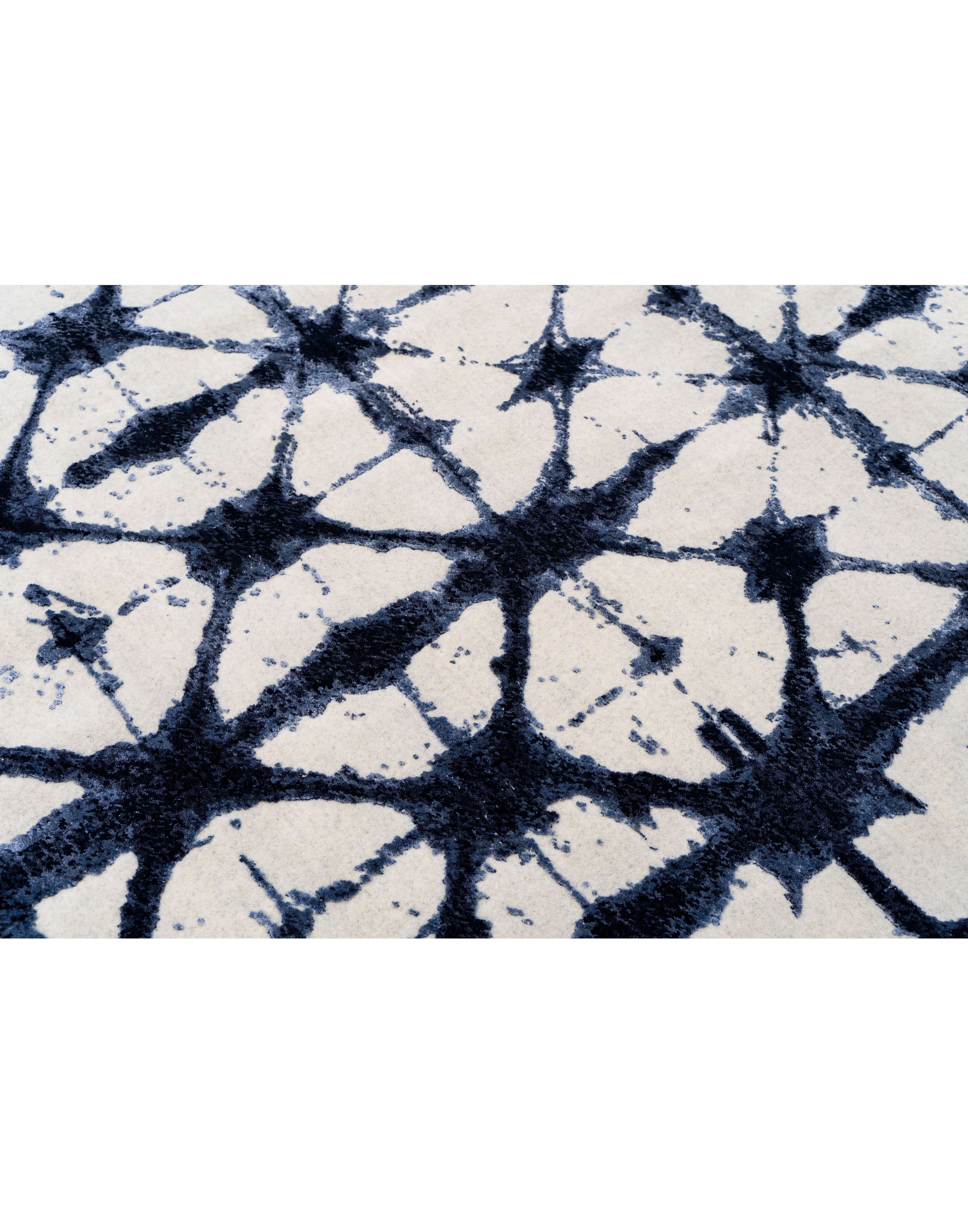 S H I B O R I luxury handmade rug by Cherom in blue wool and viscose.