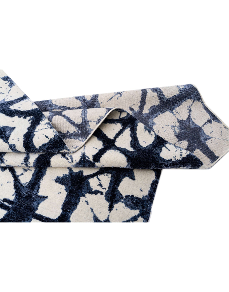 S H I B O R I luxury handmade rug by Cherom in blue New Zealand wool and viscose.