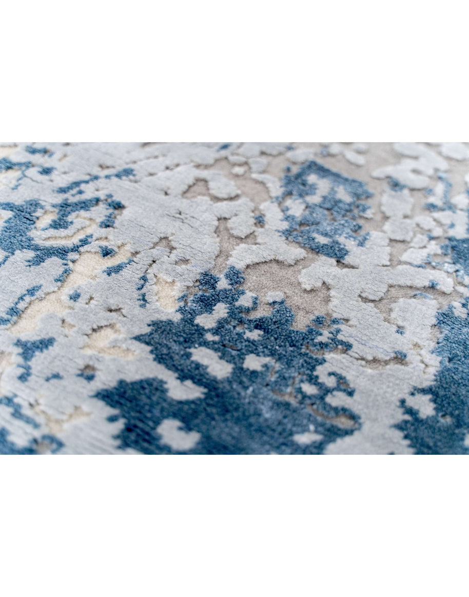 L A V E L L E luxury handmade rug by Cherom in blue wool and viscose.