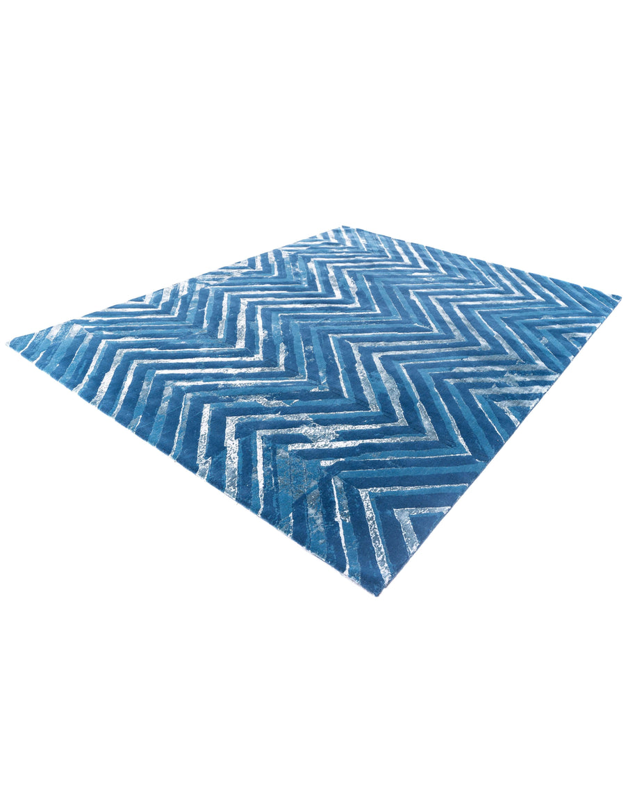F U R L A luxury handmade rug by Cherom in blue New Zealand wool, contemporary design.