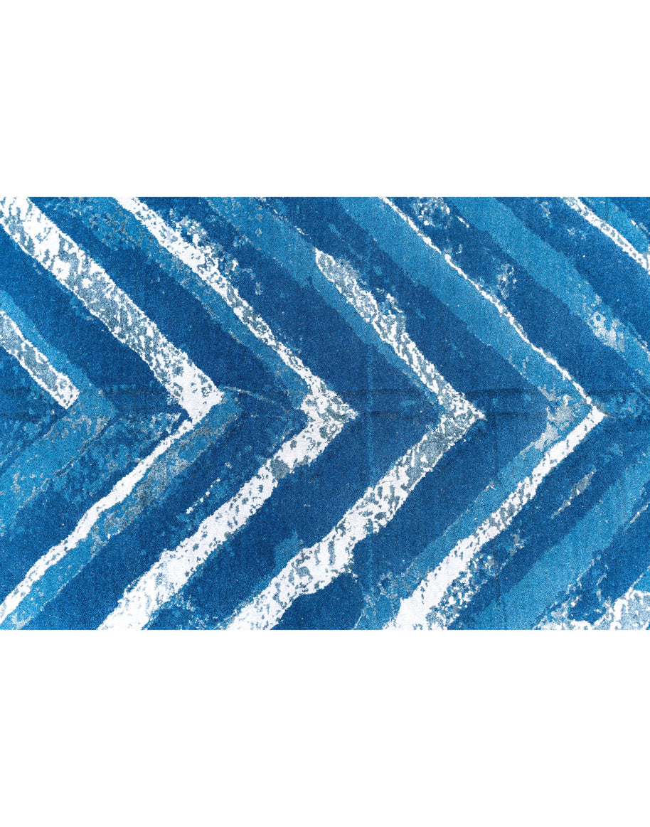 F U R L A luxury handmade rug by Cherom in blue New Zealand wool, featuring a modern chevron design.